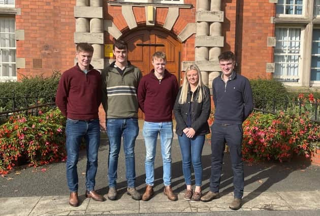 The five Omagh Academy students pictured in front of the main university building on their first week at Harper