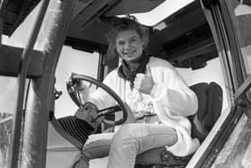 Thumbs up from Katrina Anderson from Bangor, in February 1992, who ploughed up more than furrows at the Donaghadee Young Farmers’ Club match when she raised funds for the Choice Residential Trust in the Co Down seaside town. Picture: News Letter archives