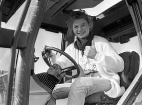 Thumbs up from Katrina Anderson from Bangor, in February 1992, who ploughed up more than furrows at the Donaghadee Young Farmers’ Club match when she raised funds for the Choice Residential Trust in the Co Down seaside town. Picture: News Letter archives