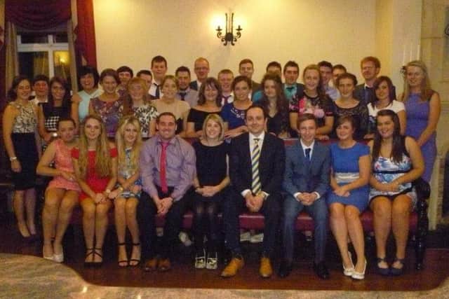 Glarryford YFC members at club anniversary dinner in 2014 at the Wild Duck Portglenone with Martyn and Barbara Blair. Picture: Glarryford YFC