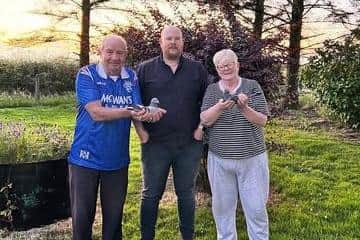 Tommy, Christopher and Anne Tweed. Anne is holding "Tommy's Dream" NIPA Silver Award winner 2023. Picture: Willy Reynolds