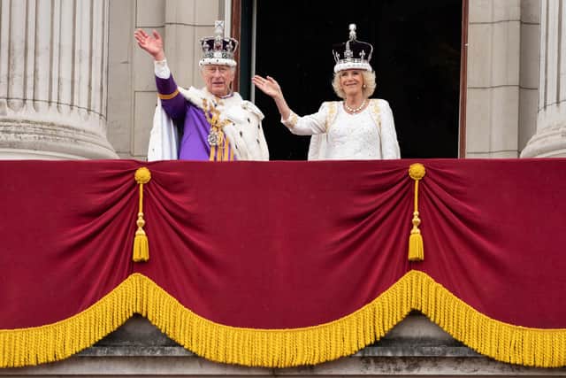 King Charles III and Queen Camilla on the balcony of Buckingham Palace, London, following the coronation
PA
