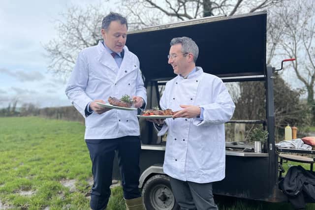 Ministers Muir and McConalogue enjoying Irish grass fed beef. (Pic: DAERA)