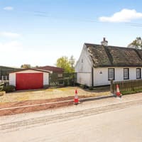 This local charming thatched cottage 'full of character and potential' up for auction