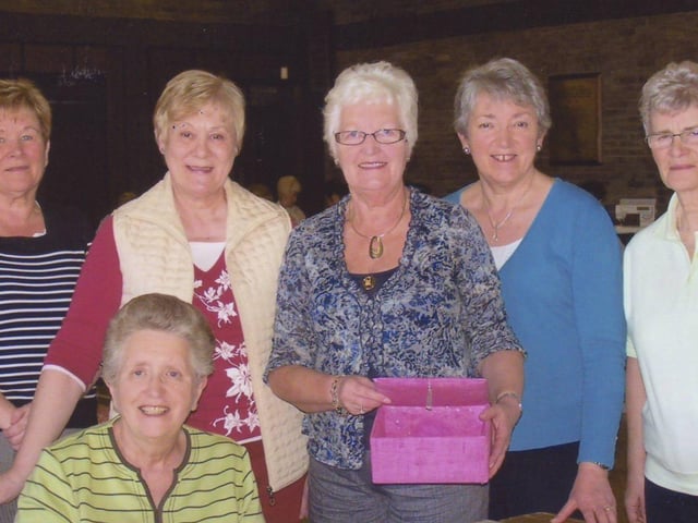 We were wondering if any of our readers might be able to identify those in the photographs.