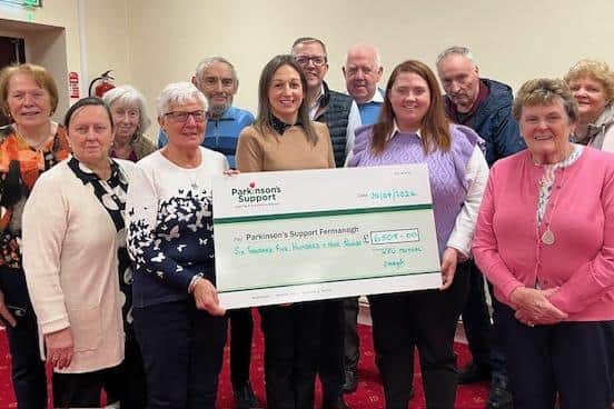 Agents from NFU Omagh along with the Parkinson’s Support Fermanagh singing group who meet weekly. (Pic: Freelance)