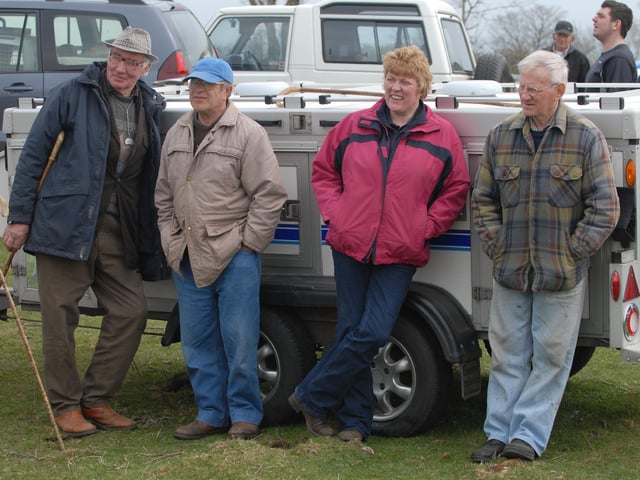 We were wondering if any of our readers might be able to identify those in the photographs.