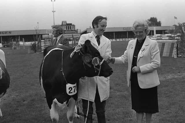 Pictured in June 1980 is Mrs R Orr who is seen congratulating Fred Duncan from Crumlin, on his Friesian heifer winning the breed championship and also reserve overall honours at the Ballymena Show. Picture: Farming Life/News Letter archives/Darryl Armitage