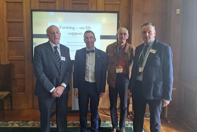 Left to right: William Taylor, FFA co-ordinator, Agriculture Minister Andrew Muir,  Paul Gosling, author of the Report - Farming On Life Support and Sean McAuley, FFA Steering Committee