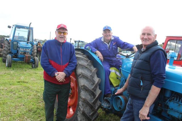 Supporting the threshing day at Scarva, from left, Rev Graham Spence, Leslie Thompson and Eugene Convery.