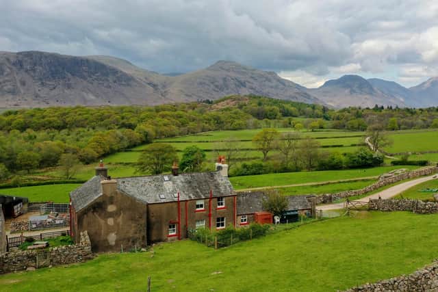 The farmhouse sits in a prominent position to the east of the farmyard and is of rendered stone construction under a slate roof. Image: Facebook/PFK Land Agency