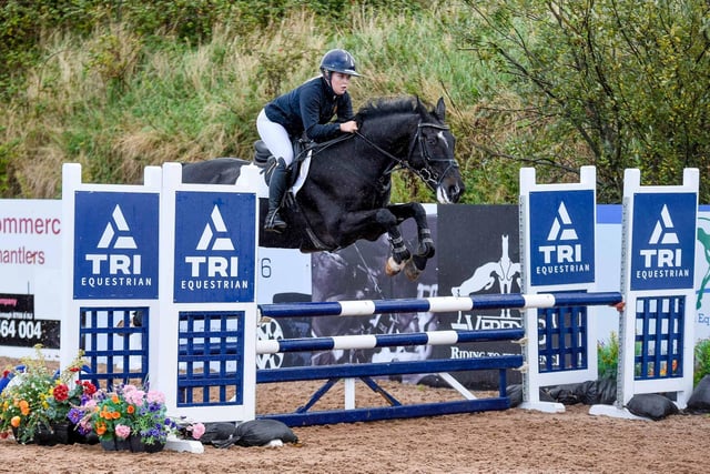Annie Gibson riding Castle Lux, part of the Winning Open Team The Down High Flyers
