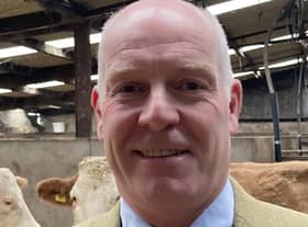 Norman Robson of Kilbride Farm Simmental herd, Doagh, County Antrim.