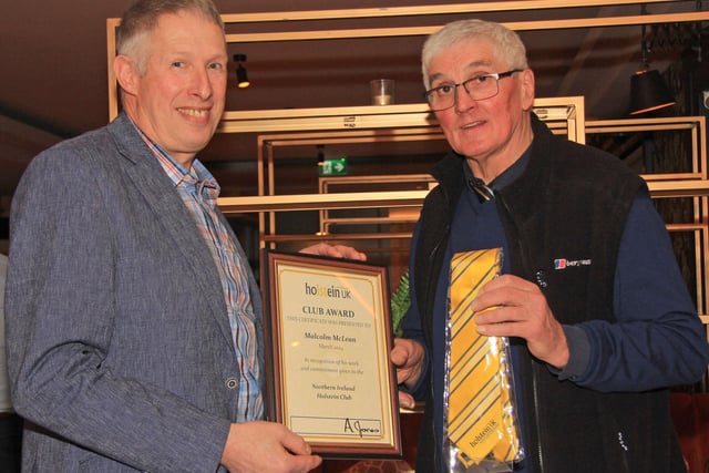 Malcolm McLean, Relough Herd, received the Club Award from outgoing president David Perry. Picture: Julie Hazelton