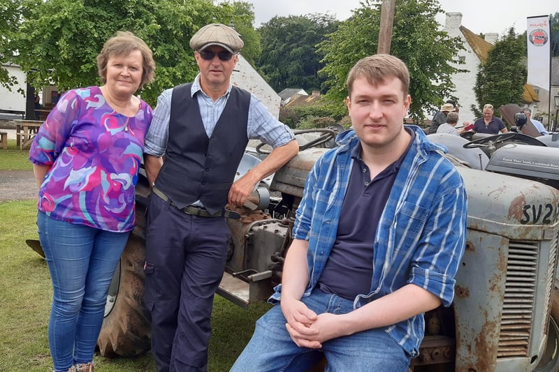 Enjoying the day at the Ferguson Day at Cultra are Gareth Mark and Geoffrey Mark from Broughshane and Leonna Booth from Broughshane. Picture: Darryl Armitage