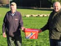 David Morgan, from Caltech Crystalyx, (right) out with Killeen sheep farmer Tom Grant earlier this week