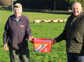 David Morgan, from Caltech Crystalyx, (right) out with Killeen sheep farmer Tom Grant earlier this week