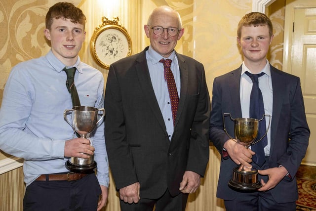 Holstein UK chairman Michael Smale congratulates HYB members Ben Reid and Tom McKnight on their achievements. Picture: Kevin McAuley/McAuley Multimedia