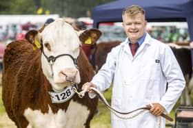 Marcus Murdock pictured at the 2023 Armagh Show with the Beef Interbreed Champion from Lurgan Show.