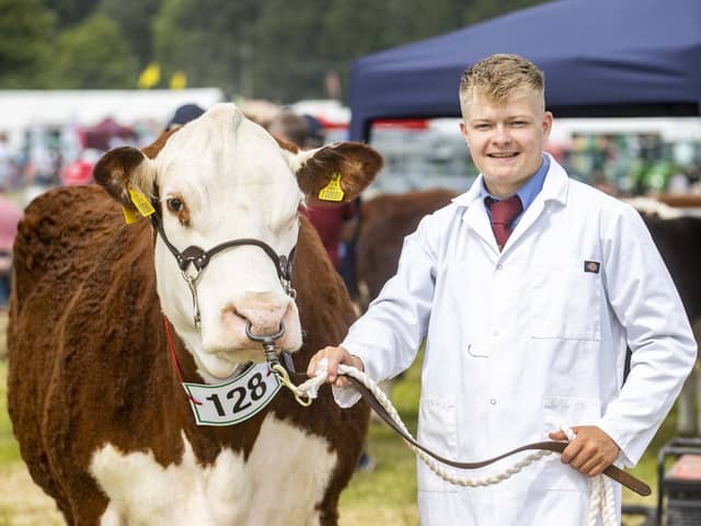 Marcus Murdock pictured at the 2023 Armagh Show with the Beef Interbreed Champion from Lurgan Show.