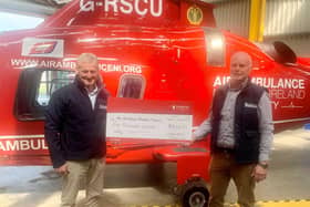 Vice Chair Keith Agnew and Chair of Lakeland Dairies, Niall Matthews presenting a cheque to Air Ambulance NI for £5,000
