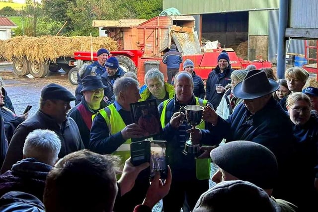 The crowd admire the new cup. (Pic: Ballynure Vintage Tractor Ploughing Society)