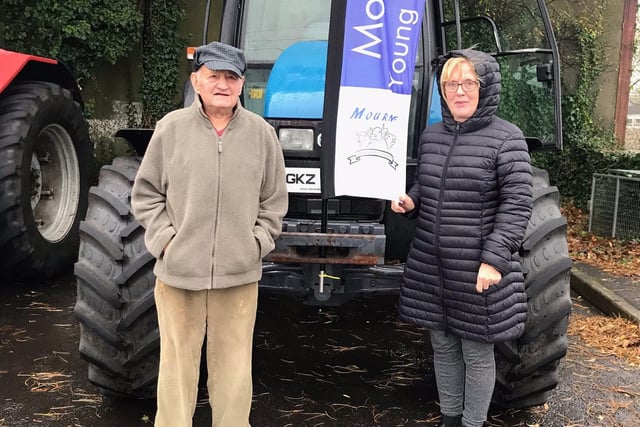 Daniel and Marian Bartley; pictured with granddaughter Laura’s tractor.