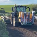 J D O'Hare sowing maize for Bannwater Holsteins, Ballynahinch, earlier this week. Picture: Kenneth Brown