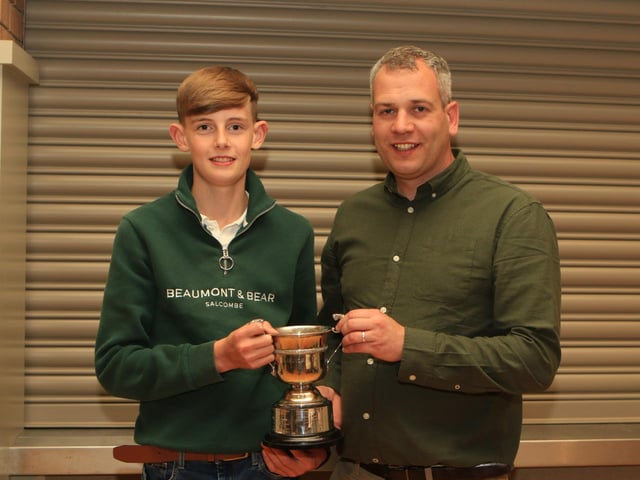 Rhys Rodgers collecting the Carnkern cup winner of this year’s under 16 stock judging competition this year presented by chairman Shane McDonald