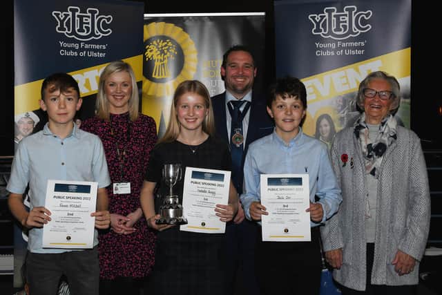 YFCU president Peter Alexander pictured with RUAS president, Mrs Christine Adams (right) and Lauren Hamilton, NFU Mutual Charitable Trust representative (left) along with winners from 12-14 age category (left to right), Frazer Mitchell, Killinchy YFC, Isabella Gregg, Glarryford YFC, and Jack Orr, Kilraughts YFC