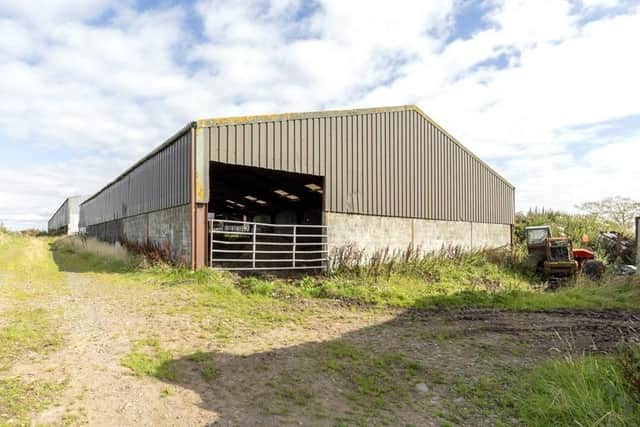 The farm buildings comprise two 90ft x 60ft general purpose sheds of steel portal frame construction, block walls, vent air cladding and a corrugated fibre cement roof. Image: www.galbraithgroup.com