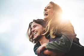 Shot of a happy young couple having fun outside.