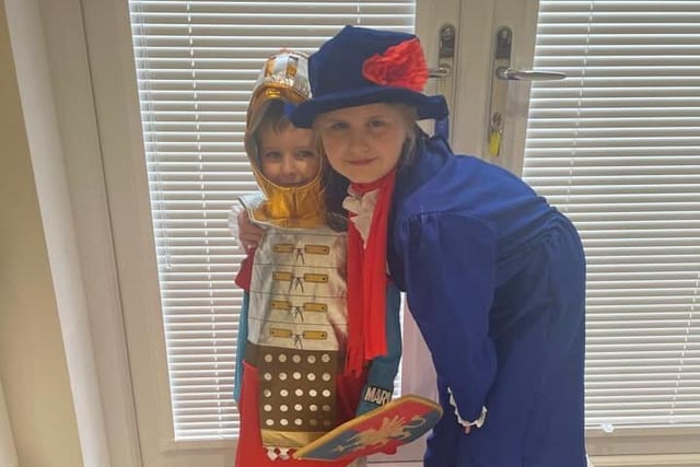 Brave Knight, four year old Olly, and sister Lily, aged nine, dressed as Mary Poppins.