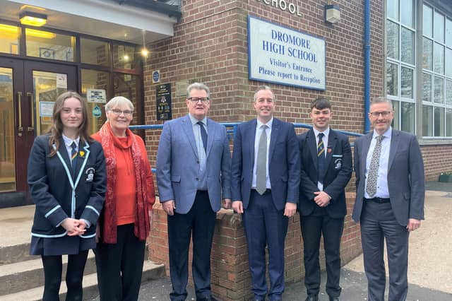 Education Minister Paul Givan with Principal Ian McConaghy (far right), members of the Board of Governors, Head Girl and Head Boy, during a visit to Dromore High School.
