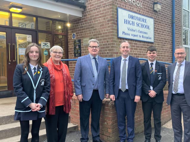 Education Minister Paul Givan with Principal Ian McConaghy (far right), members of the Board of Governors, Head Girl and Head Boy, during a visit to Dromore High School.