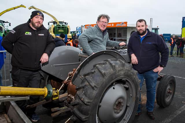 Kirkistown volunteer, Darren Gilmore, Kirkistown Race Circuit Manager, Donal O'Neill and event organiser, Stevie Evans pictured at an agricultural dyno day held recently at Kirkistown Race Circuit that raised in excess of £10,000 for charity. (Photo by Graham Baalham-Curry)
