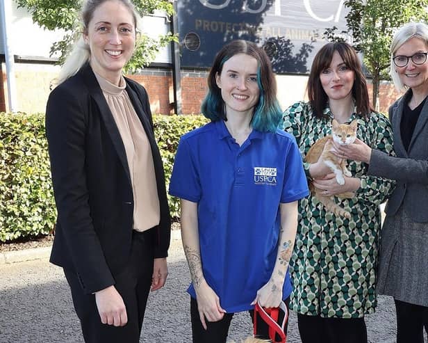 Pictured (l-r) are Gemma Daly, Deputy Chief Veterinary Officer, DAERA, Darragh McShane with her adopted dog Fergus, Leanne Williams with her adopted cat Charlie and Nora Smith, CEO of the USPCA. Pic: Peter O'Hara Photography