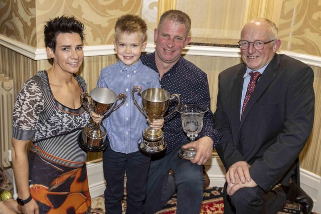 The Paul family, Alan, Leanne and Cody, Slatabogie Herd, Maghera, received a number of awards at Holstein NI’s annual dinner in Ballymena. They were congratulated by Holstein UK chairman Michael Smale. Picture: Kevin McAuley/McAuley Multimedia