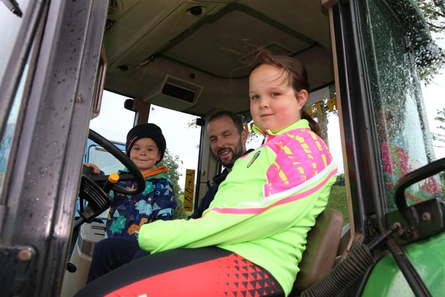 Aaron, Grace and Alex Watt pictured at the Loughguile Church of Ireland Tractor run on Saturday. Picture Kevin McAuley/McAuley Multimedia