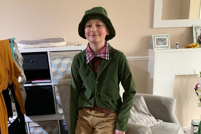 10-year-old Ethan Marshall is dressed up as the famous Oliver Twist - an orphan in Charles Dickens's novel, set in the 1800's