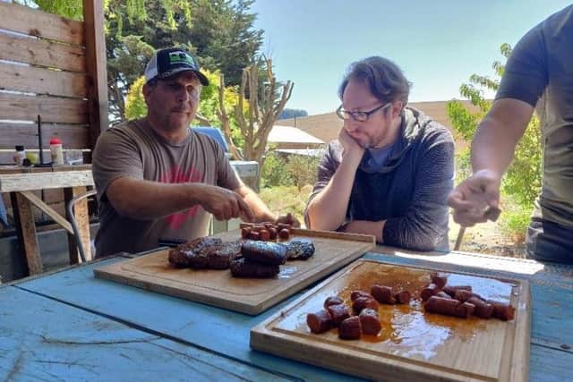 Loren from Stemple Creek (Left) serving some of the produce to a group of butchers and chefs who were getting a tour of the ranch.