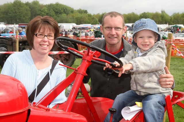 Sam and Tanya Patterson with their son Harry at the Steam Rally. AT19-454AC