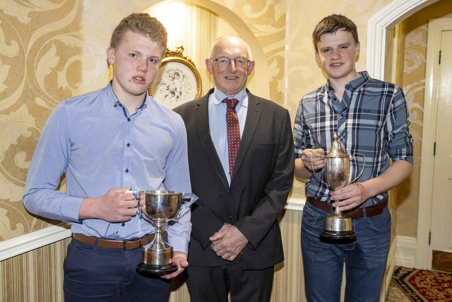 HYB members Max Watson, Coleraine, and James Patton, Carrowdore, were joint winners of the award for the highest placed competitor at the HYB’s national competition. James also won the Smiddiehill Trophy. They were congratulated by Holstein UK chairman Michael Smale. Picture: Kevin McAuley/McAuley Multimedia