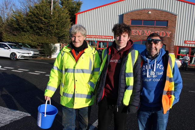 The organisers of the tractor run at McCoy's Garage, Katesbridge, on Monday. From left, John, Sam and Colin Jardine.