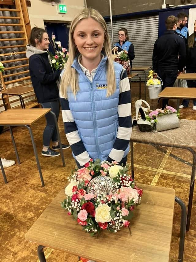 Zara Stirling with her winner floral arrangement