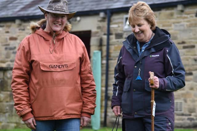 Jean Howes (right) and buyer, Alison Bell (left), with Ruby, who sold for 4400gns Picture: Adrian Legge