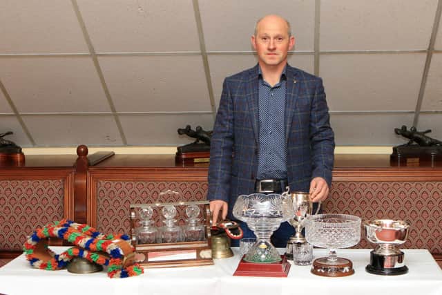 Frank Kelly collecting the impressive array of Silverware, won at the various shows throughout the 2022 season with Ashland Topaz Lopaz bred by Pat & Frank Kelly.