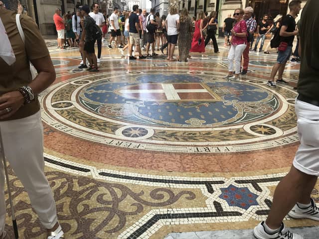 The tiled floor of the stunning Galleria Vittorio Emanuele II shopping centre