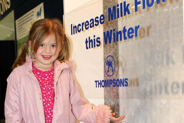 Four year old Anna McCready, Ballyward, Castlewellan, checks out the Increasing Milk Flow display on the John Thompson and Son's stand at the RUAS Winter Fair.