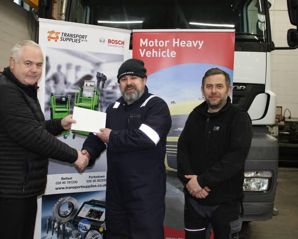 Mark Bowring, from Magheralin, a Level 3 Vehicle Maintenance & Repair (Heavy Vehicle) apprentice, employed by the Education Authority who took first place in SERC’s Heavy Vehicle College Competition.  Left to right, David Monroe, Director, Transport Supplies (NI) Limited, Mark Bowring, and Michael Hutchinson, Lecturer in Motor Vehicle. Picture: SERC